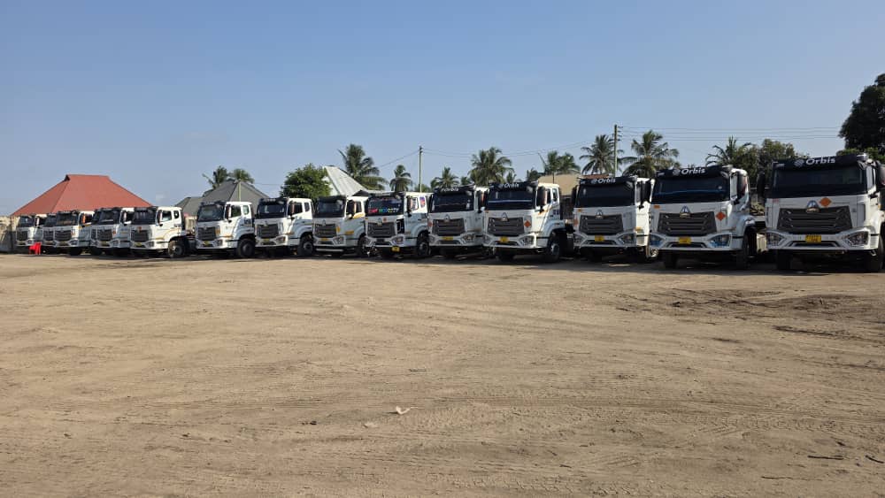 Row of Orbis trucks in the yard